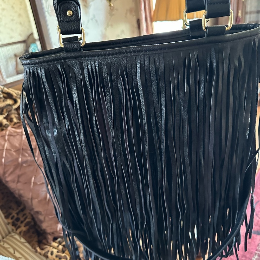 Excellent condition black fringe bag